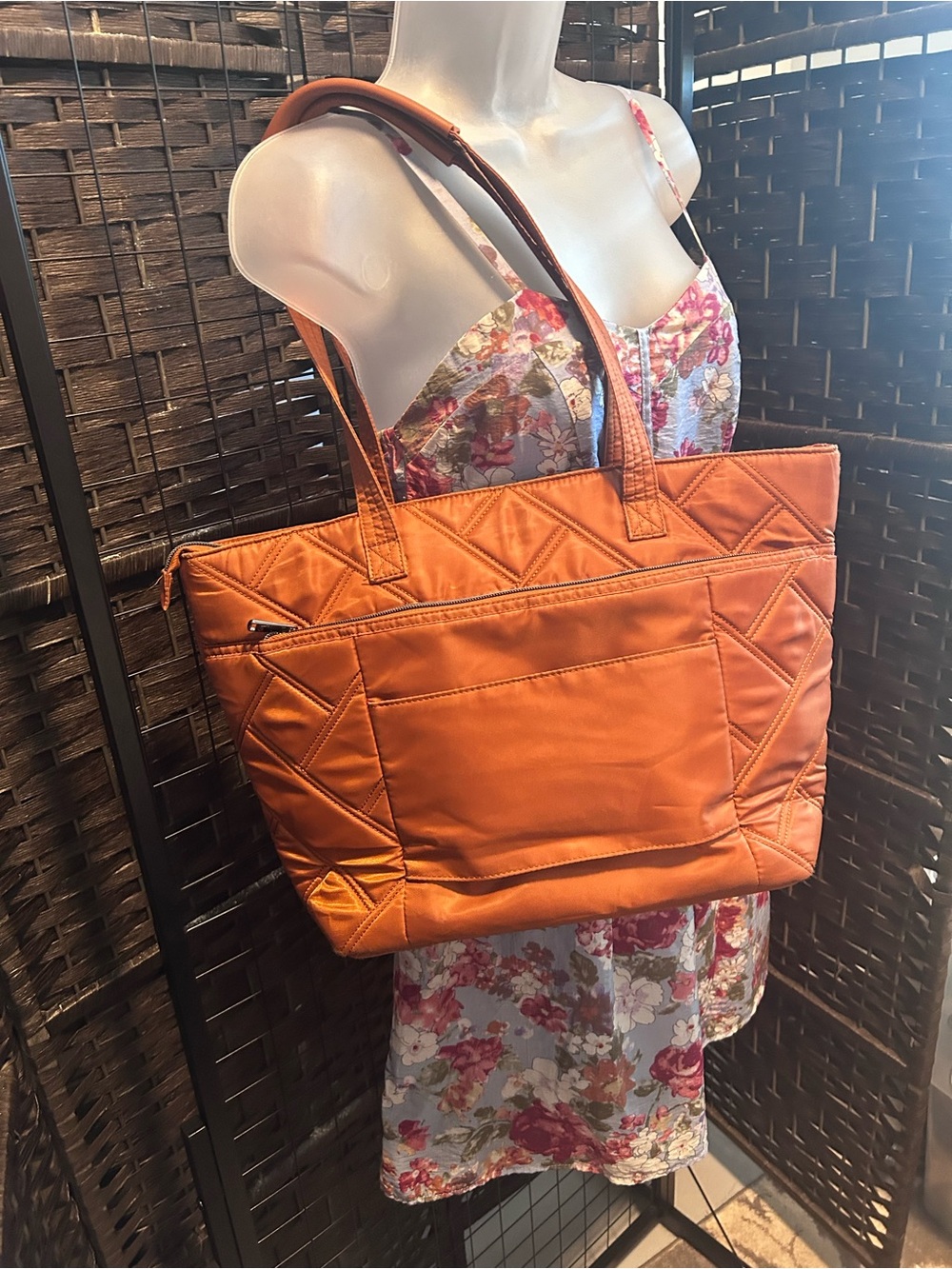 LUG skyliner quilted tote in copper brown.with zebra interior. organization